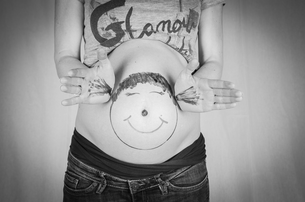 Baby belly with drawing