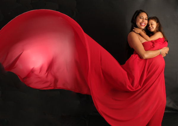 A baby bump shoot needs a lot of space with elegant clothes, a photo studio is ideal for this.